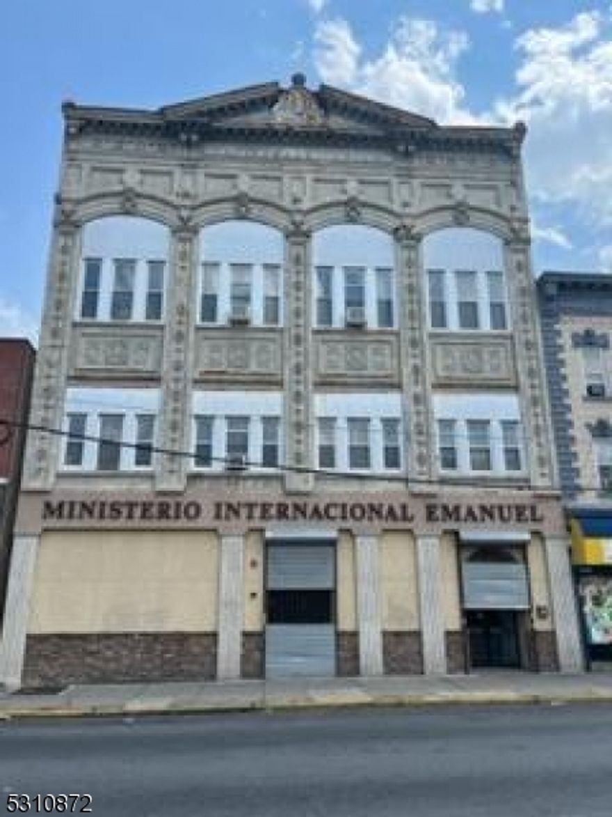 Iconic building centrally located in the heart of Passaic operating as a house of prayer with two additional floors with 5K square feet each floor, third floor has a mezzanine with over 20 feet height to the roof line.  Tax exemption in place so is ideal for the same use.  Sanctuary on the first floor was rehabbed with no detailed spared to bring it to its glory along with the second floor.  Seller open to owner financing.