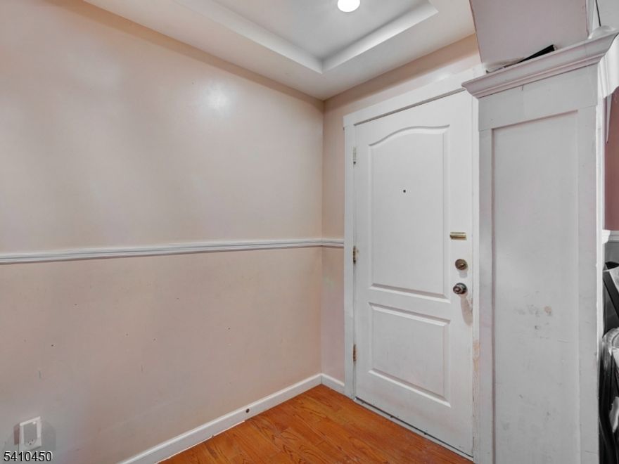 Excellent cash-flow opportunity with this well-maintained two-family property, featuring two large units, each offering 3 bedrooms and 1.5 bathrooms. Both units include an open-concept living and dining area and a convenient first-floor guest half bath. The property was fully renovated in 2017, including new plumbing, electrical, roof (front metal / rear rubberized), new siding, and central air with forced hot air heating, keeping capital expenses low. Separate utilities for each unit and dedicated basement storage. The property is fully fenced, with an iron front fence and PVC fencing throughout, and offers a huge parking area,. Tenants are month-to-month, providing immediate flexibility for rent increases or owner occupancy. Conveniently located near major transportation and amenities. Strong income potential with minimal maintenance?ideal for investors or owner-occupants.