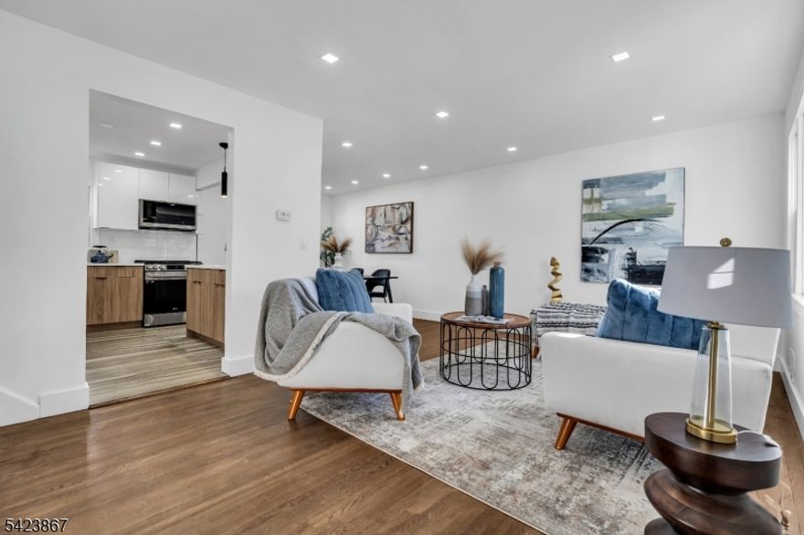 Welcome to this beautifully updated split level home in one of the most desirable neighborhoods. Step inside to find modern features throughout including a stunning chef inspired kitchen updated bathrooms and bright comfortable living spaces perfect for everyday living and entertaining. A fully finished basement adds even more room for relaxation recreation or a home office. The home offers central heating and cooling for year round comfort along with a gorgeous private backyard ideal for unwinding or hosting gatherings. A spacious driveway provides convenient off street parking. Located just minutes from the Garden State Parkway and surrounded by top rated schools this home combines style comfort and an unbeatable location. Do not miss this exceptional opportunity.