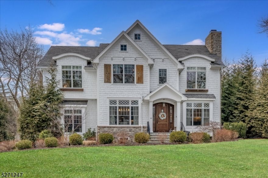 Spectacular newly built home completed by local luxury builder on over .5 acres. Luxurious 4 levels of living space on a private lot and peaceful tree lined street. The interior of the home features 7 BR/8.5BA, sprawling first floor with a chic living room with wood burning fireplace, formal dining room with wet bar, home office with private bathroom, and grand open floor plan. Family room with wood burning fireplace and beamed ceiling open to the chef's kitchen with top of the line appliances, furniture grade cabinets, heated floors, new pantry and breakfast area with access to back patio and level private backyard. The primary suite offers vacation vibes with inviting gas fireplace, dual large custom walk-in closets, separate vanity area and bathroom with heated floors and oversized shower. Four additional bedrooms all with en-suite bathrooms and laundry complete the second level. Third level includes a bonus room/bedroom with private bathroom and ample storage. Large basement with high ceilings and new Italian tile floor, features rec room with gas fireplace, home theater/gym, wine cellar & nanny or guest quarters. Additional features include 3 car garage, new custom window treatments, whole house backup generator, large windows and exceptional trim work throughout. Newly upgraded telecommunications room, new five hi-definition security cameras and new security panel, system and doorbell. Near great schools and transportation.