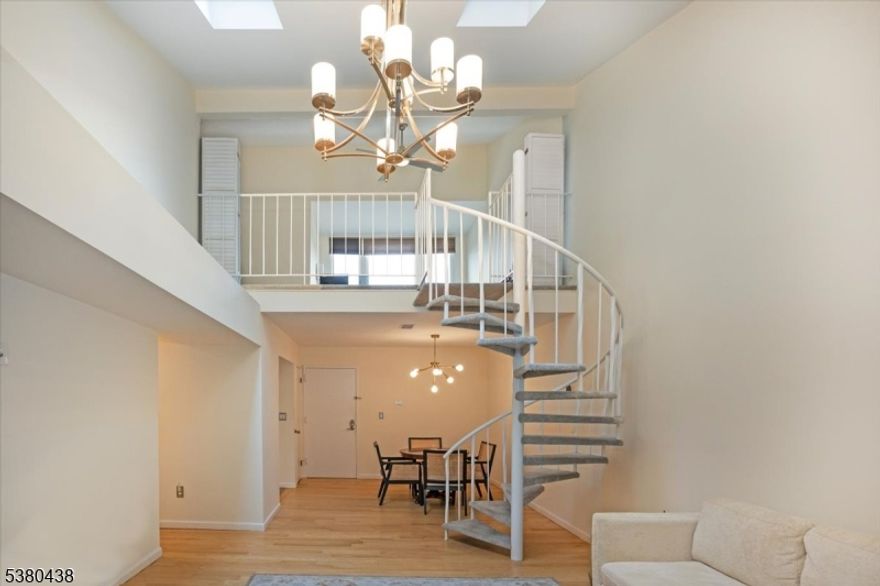 The best kept secret in Morristown.  Minutes to the center of town yet private and nestled on a hill backing to Fort Nonsense State Park.  This nicely updated 2 bed 2 bath unit also has a large 2nd floor loft to use as a rec room plus another area that can be used as an office or space overnight guests. The loft also has skylights, and a large 9x6 walk in closet. Soaring Ceilings on the first level with skylights bring in so much natural light and gives an expansive feel.  Kitchens and Baths have been updated and the 1st level has beautiful hardwood floors.  Forced air heat and central air with washer and dryer in the unit makes this unit a do not miss.  The unit faces Fort Nonsense Park and provides lovely nature views and privacy from the deck.  Enjoy all Morristown has to offer leave your car home!  Shopping Dining Nightlife Theater Mid Town Direct Train to NYC Penn Station, then come home to your private retreat.  Great condo building with 1 assigned space and potentially 1 additional space available.  The lobby is secure and there is a gym for residents to use on the lobby level. There are no steps to enter the building and an elevator for easy access to all floors.  1 assigned parking space and potentially 1 additional free space first come first served.  Storage unit on lobby level is not available to tenants