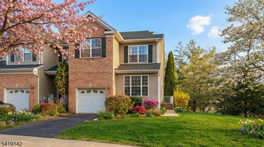 Bright and spacious end unit in Montgomery Hills offering exceptional natural light and a well-designed layout. The first level features gleaming hardwood floors, a two-story foyer, and a sun-filled living and dining area. The kitchen is beautifully appointed with quartz countertops, a center island, 42-inch cherry cabinets, newer stainless steel appliances, a pantry, and a breakfast area with sliders leading to the backyard. The family room includes a cozy gas fireplace and an inviting open feel. Upstairs, you'll find three generously sized bedrooms with newer carpeting, ceiling fans, and recessed lighting. The main bath has been tastefully updated. The primary suite offers a spacious layout with a walk-in closet and a luxurious bath featuring dual vanities, a jetted tub, and a separate shower.The home has been freshly painted throughout. The fully finished walkout basement includes new carpeting and a separate utility room, providing excellent storage. A one-car attached garage with opener completes this move-in ready home. Conveniently located near major shopping and just a short drive to Princeton's Nassau Street, known for its dining and boutique shopping. Located in the highly regarded Montgomery Township School District, recognized for its Blue Ribbon, top-tier schools.