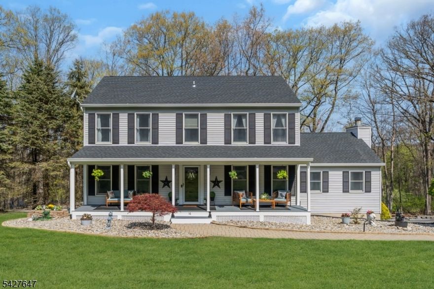 Homes like this don't come on the market often! Set on nearly 1 acre, this meticulously maintained center hall colonial offers numerous updates and improvements, including a new roof, new gutters, newly connected natural gas, new tankless water heater, and a generator hookup outside for added peace of mind. Inside, you'll find a spacious layout with well-kept hardwood floors and comfortable living spaces throughout. The full finished walkout basement is set up as an in-law suite, complete with a full bath and kitchen, offering great flexibility for extended living, guests, or recreation. Outside, the two-tiered deck overlooks a heated in-ground pool, creating the perfect setting for summer gatherings and everyday relaxation. With privacy, updates, space, and versatility, this home offers endless opportunity with practically nothing to do but move right in!
