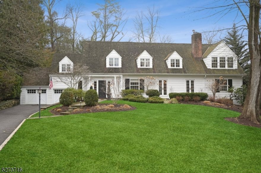 Exquisite curb appeal & storybook facade, this 5 bd, 3.1bth, almost .75 acre property is a homebuyers dream! Five sets of French doors on the 1st fl open onto sprawling blue stone patios for entertainers' delight! Eat-in Chef's kitchen w/TOP OF THE LINE appliances, lit glass cabinets & undermount lighting, six-burner stove w/griddle, wall oven, two dishwashers, two sinks & island seating for four. Large FR w/cozy wood-burning fireplace & custom built-in's. Formal LR w/sprawling bay windows, french doors & RADIANT flooring. Butler's Pantry w/glass lit cabinets, double bev. refrig., hammered steel sink. Sun-drenched DR w/woodburning fireplace & two sets of french doors open to a blue-stone patio for stunning sun-sets. 1st fl office & extra spacious mud-room makes easy access to the 2-car heated oversized garage. Enormous Primary Suite w/vaulted ceiling spans the front & back of home, window seating w/extra storage, four large closets (2 are walk-in), spa-like bath w/RADIANT floors, dual sinks & jetted tub. Four add. LARGE bedrooms upstairs won't disappoint with a newer marble hall bathroom (RADIANT FL) & 2nd fl laundry rounding out the 2nd fl. Ground fl boasts Rec room, Gym w/mirrored walls, wine vault (approx. 400), powder room & 2nd laundry room. NEW TILED HEATED POOL w/SWIM JET & SUNDECK, PLUSH PERENNIALS for ultimate PRIVACY, FULL HOUSE GENERATOR, BRAND NEW SURROUND SOUND, UTILITIES UNDERGROUND, QUIET PRIVATE STREET, steps to Millburn town & TOP RATED schools. Welcome HOME!