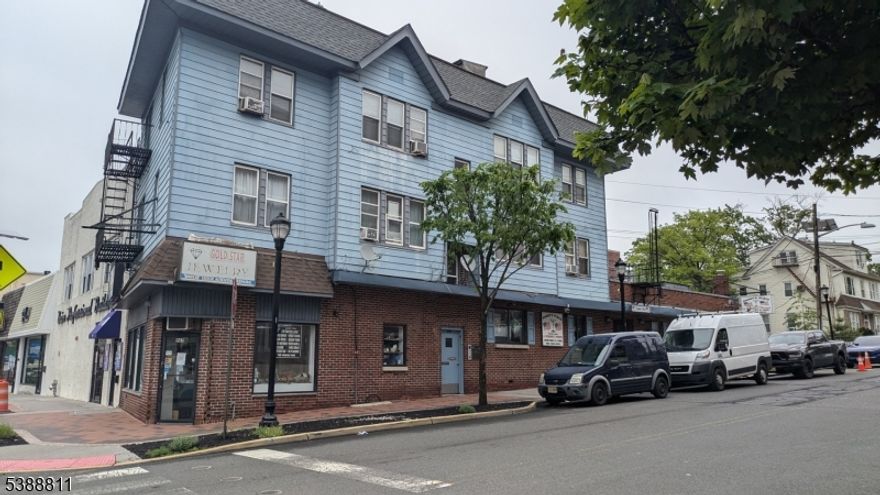 Exceptional investment opportunity! This mixed-use property offers strong income potential with both residential and commercial tenants. The building features four 2-bedroom apartments currently rented below market at $4,900/month, with the ability to increase to approximately $8,000/month at market rents. The commercial portion includes a storefront ($2,500/month), a bar/restaurant leased at $4,500/month under a 5-year lease (plus an additional $2,000/year collected for property taxes, with separate utilities), and a Verizon antenna lease generating $11,000/year. Total current monthly income is approximately $12,816, with the potential to reach $19,500, translating to a Gross Operating Income (GOI) $153,792 annually. Estimated expenses include taxes ($18,177-$25,177), insurance ($12,695), and water ($1,500/year). The Net Operating Income (NOI) is currently estimated at $121,420.