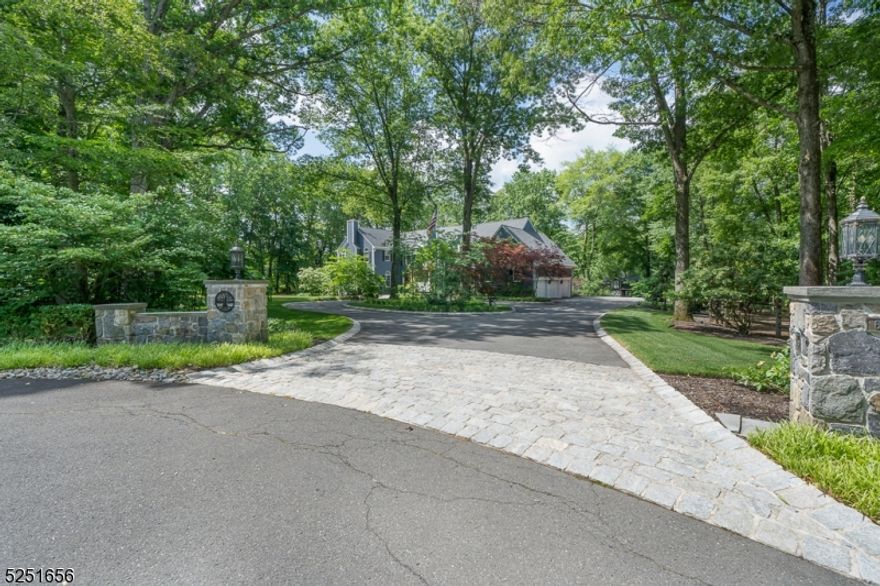Blue stone Pilars and a spacious circular drive welcome you to this lovingly cared for home which is set on a private park-like landscaped 4 acres at the end of a cul-de-sac, adjacent to Green Acres.  This 6 bd Colonial has it all with no detail overlooked. The grounds offer a multi use sports court- including a tennis court with covered gazebo, basketball, ice hockey and plenty of pickle ball space. A spacious trek deck wraps around the back and steps down to the fire pit area.  As you enter the main doors you are greeted with lots of light where you can admire the expert craftsmanship adorning the magnificent stairwell that sets the stage for luxury, comfort and beauty.  The 1st floor features a warm custom eat-in kitchen with a large honed granite island. The living room offers a serene setting with a fireplace and custom mill work is everywhere. Relax in the family room with vaulted ceilings, a stone fireplace and a custom bar.  The home also offers a convenient first floor bedroom.  The second floor can be reached by a back staircase from the mudroom.  The Primary en-suite has a fireplace, 2 custom walk-ins and a soaking tub overlooking the stunning backyard.  Not to be missed is the newer lower level with a billiards room, office, work-out room and more...All this located within minutes to Morristown, Madison, Mendham, Liberty International Airport, NYC transit,and major highways for convenience. The attractive Harding taxes complete this offering.