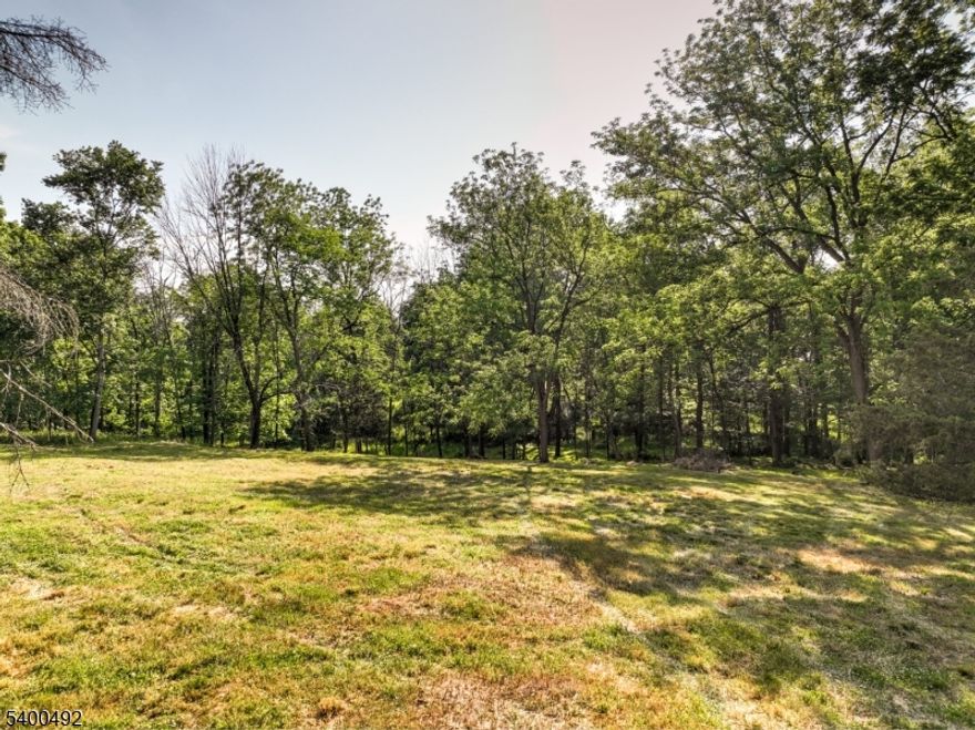 Tucked away from the road, this nearly six-acre lot offers a generous level area along with gentle slopes down to a small stream, making it perfect for a walkout basement. With an approved septic design for a five-bedroom home and a successful perc test, it's well-suited even for a larger residence. Conveniently located between Route 202 and Route 22, you'll have quick access to amenities while enjoying the privacy of a nature-filled retreat.