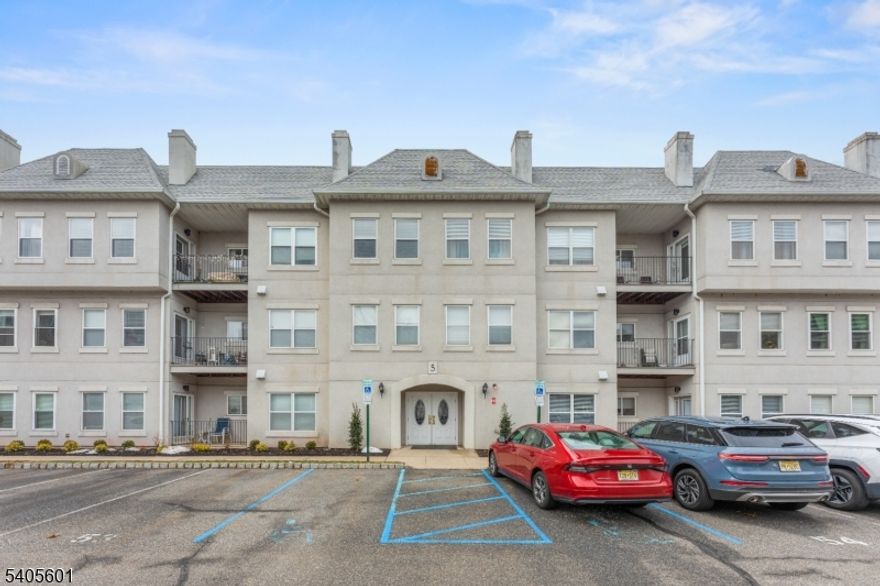 Welcome to Brittany Chase in Wayne! Take the elevator to your second-floor, penthouse-style end-unit townhouse, where bright, open-concept living meets everyday convenience. This 3-bedroom, 2"full-bath home features hardwood floors throughout and an expansive living and dining room combination ideal for both entertaining and daily living. Step out onto your private balcony, overlooking beautifully landscaped grounds and offering a peaceful connection to the outdoors. The renovated kitchen provides ample cabinetry and additional storage, blending style with functionality. The home includes a spacious primary suite with a private full bath, plus two well-sized additional bedrooms, one featuring a brand-new Murphy bed for added flexibility. A separate laundry room off the kitchen adds convenience, and all appliances are included. Recent updates include new central air conditioning and a new water heater, ensuring comfort and peace of mind. Additional highlights include elevator access, assigned parking, extra basement storage, and a large visitor parking lot nearby. Brittany Chase offers resort-style amenities including a pool, fitness center, tennis courts, and a clubhouse with a full kitchen. Comfort, space, and community this home truly has it all.