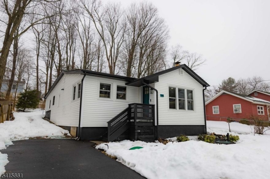 Gorgeous renovated lake view Ranch, a must see! Beautiful open floor plan with renovatedkitchen, including center island and new appliances. Lots of windows and natural light withrelaxing lake views