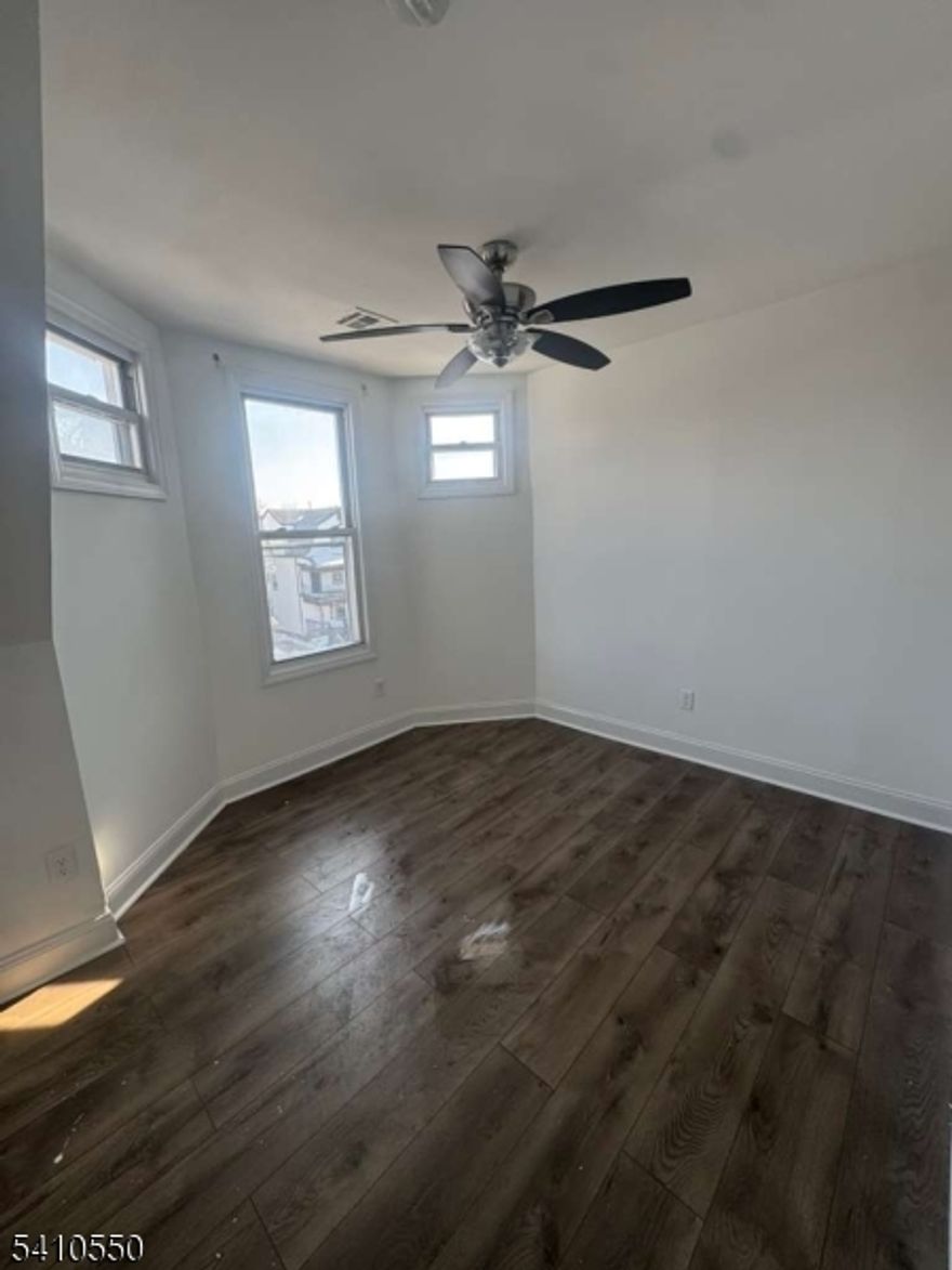 163 N 18th St, located in the Ampere section of East Orange, offers a well-maintained 1-bedroom, 1-bath apartment featuring a comfortable living area, a functional kitchen with cabinet storage, and a bright bedroom with natural light. The bathroom includes tile finishes and standard fixtures. No pets permitted. Conveniently situated near NJ Transit bus lines, local shops, parks, schools, and major roadways, this location provides easy access to Newark, surrounding towns, and NYC commuter routes.