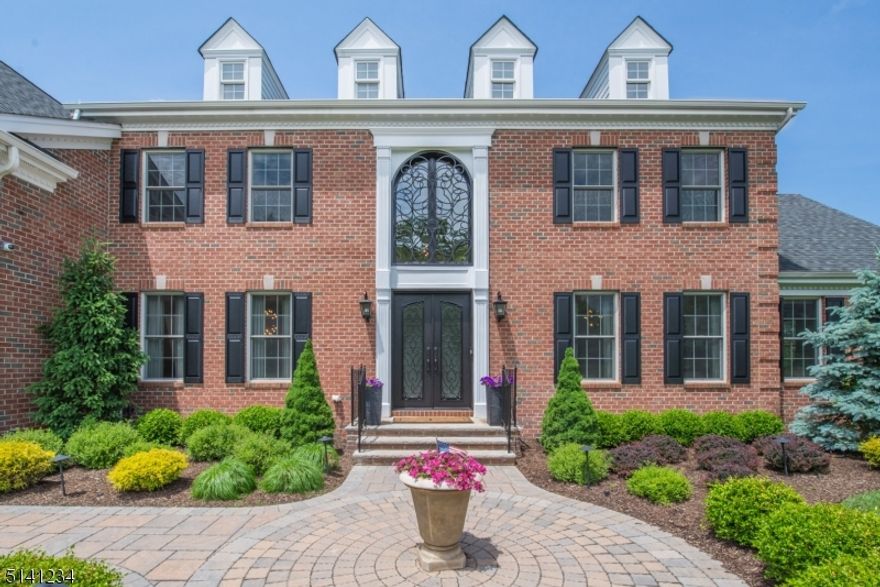 Welcome to perfection! Stately Colonial w over 5000 sqft boasts stunning refinement at every turn! Exquisitely renovated in 2019 to the highest standards.Meticulous attention to detail is evident thru out. Contemporary styling is mixed w inviting decor.Grand 2 Story entry brings you to chefs kitchen & BB w Silestone counters and waterfall breakfast bar.  Unique butlers bar & 2 story FR w windows galore bringing in tons of natural sunlight! Expansive MB Suite with Sitting Room and 3 walk in closets beyond your wildest dreams!Top it off w a M/Bth bar none!Beautiful oversized Spa Shower & Sauna to relax in!W/O LL is a delight! Exercise rm & great room to spend quality time.Private yard includes beautiful deck, patio and firepit to enjoy all year!Go to docs for the full list of amazing features this home has to offer!