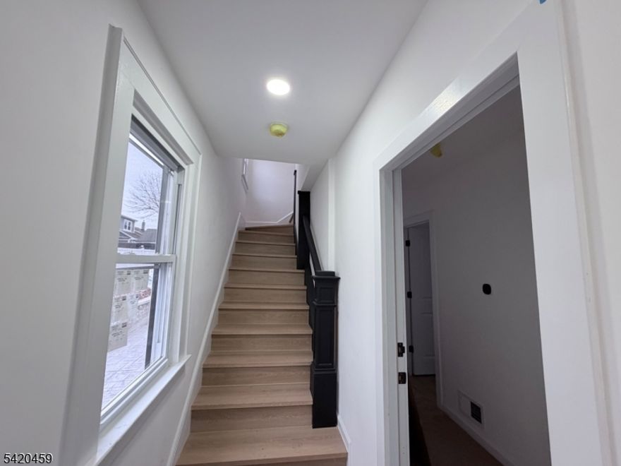 Welcome to this beautifully fully renovated two-family home, offering the perfect blend of modern upgrades and income-producing potential. Each unit features spacious layouts, updated kitchens with stainless steel appliances, sleek bathrooms, and abundant natural light throughout truly move-in ready.