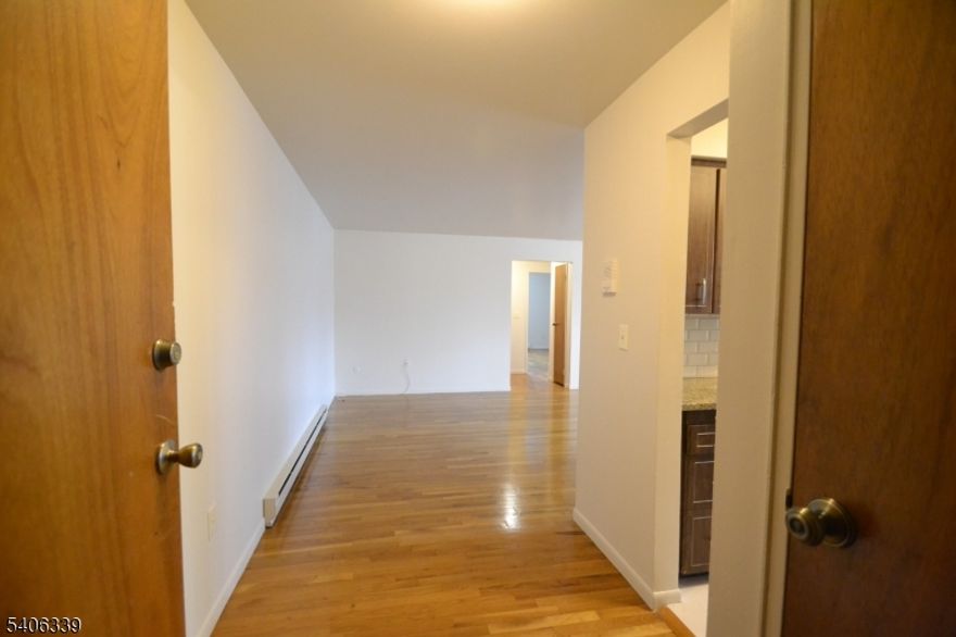 One of Cliftons finest garden apartment complexes. This unit offers first floor living with an open floor plan, hard wood floors, updated kitchen with granite counter tops, all stainless steel appliances except microwave. Added bonus include open storage, coin operated laundry, 2 parking spaces and plenty of guest parking.