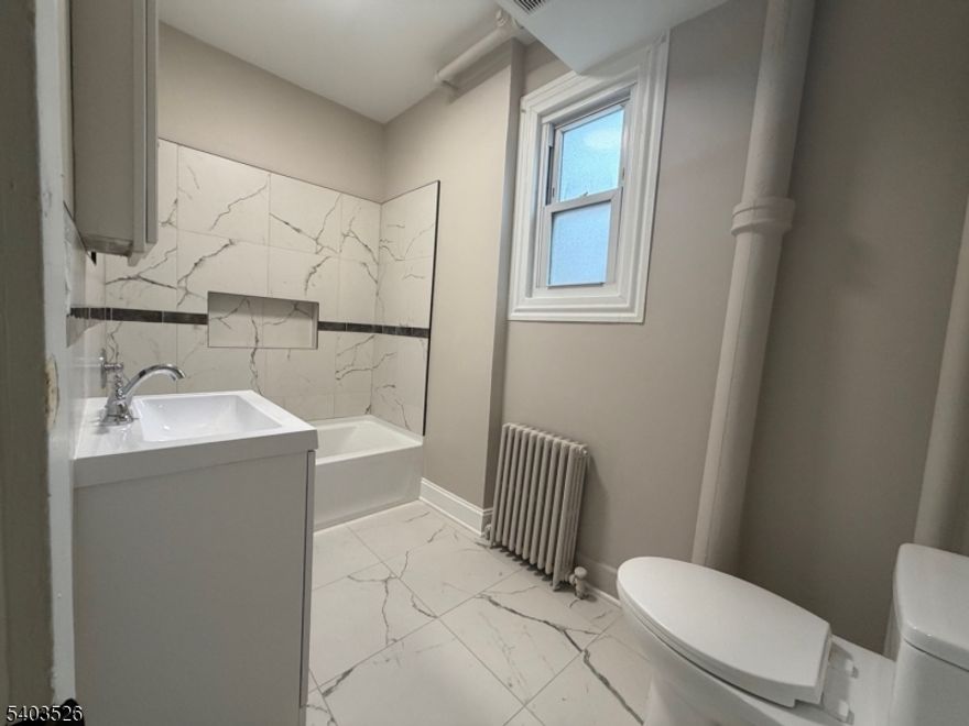 This well-maintained first floor apartment offers a comfortable and functional layout, featuring a dining/living room combo, a cozy bedroom, and an updated bathroom, making it move-in ready. Conveniently located just minutes from New York City with easy access to public transportation, making it a great option for commuters. Close to shopping, restaurants, parks, and major roadways. Enjoy the convenience of living in a vibrant Union City neighborhood. As an additional bonus, WiFi is included.