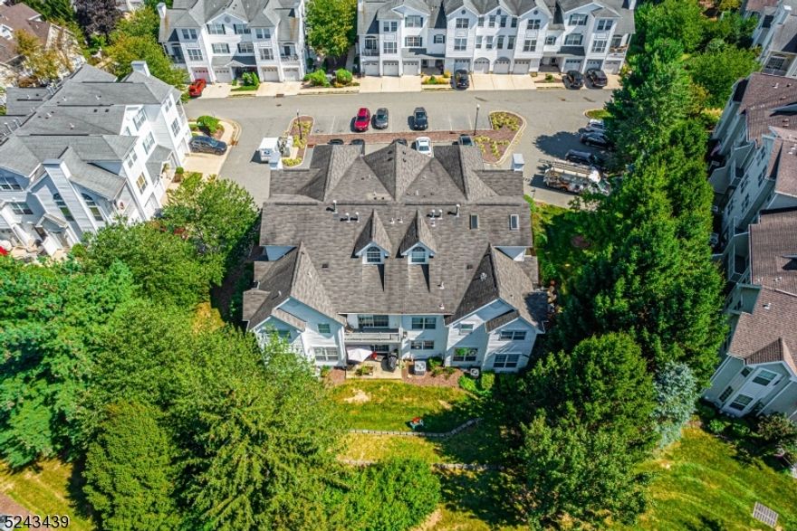 Located amid natural beauty for which Morris Township is known, yet close proximity to Morristown's historic & bustling downtown (The Green). This spectacular end unit, multi-level living is conveniently located just 1 mile from NYC Direct Train Station, buses & easy access to major highways. Desirable Chelsea floor plan, first floor entry on prime street in Rose Arbor. Open & bright layout, oversized windows with a Gas Fireplace, custom blinds, moldings, high ceilings and beautiful engineered wood flooring. Completely redone just a few years ago- renovations include updated baths, updated eat-in kitchen with new SS refrigerator, quartz countertops and slider to private, extensive patio. Powder room. Upstairs, a master bedroom with cathedral ceilings, full bath with soaking tub & stall shower, closet which includes a walk-in. Second generous sized bedroom with the second full bath & walk in closet. Pristine condition. Full, finished basement. Newer full size washer & dryer. Heat/ AC condenser only two years old. The attached 1-car garage, with indoor access provides a ton of storage along with parking in addition to a dedicated driveway and tons of visitor spots. Wonderful community with walking paths (Patriot's Path). Morris Township has a township pool, community gardens, programs for all ages and so much more!