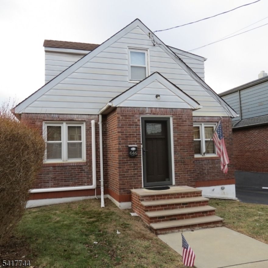 Well Kept Brick Cape Cod updated throughout the years with newer windows , roof , electric , furnace ,hot water heater , split A/C unit .Beautiful Hardwood floors ,open staircase,entry foyer .