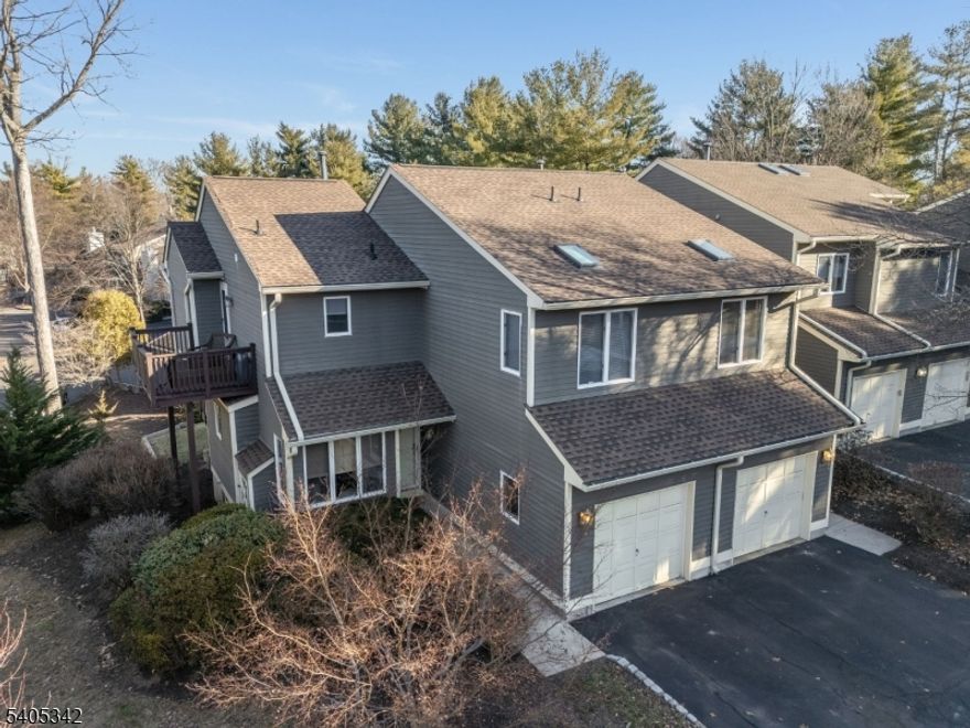 Welcome to this beautifully updated two-bedroom Beaver Brook townhouse offering the perfect blend of comfort, style, and low-maintenance living. From the moment you enter, you'll appreciate the open, light-filled layout, hardwood flooring, and thoughtful finishes throughout.The updated kitchen features white cabinetry, granite countertops, stainless steel appliances, and a center island ideal for everyday living and entertaining. The adjacent dining area opens to the living room with vaulted ceilings, creating an airy, inviting space.Upstairs, you'll find two generously sized bedrooms, including a spacious primary suite, and a tastefully renovated full bathroom with a tiled shower and soaking tub. The finished basement adds valuable living space perfect for a home office, gym, media room.Additional highlights include a one-car garage, updated baths, recessed lighting, neutral decor, and ample storage throughout. Enjoy all the benefits of Beaver Brook community living, including beautifully maintained grounds, walking paths, and convenient access to shopping, dining, and major commuter routes.