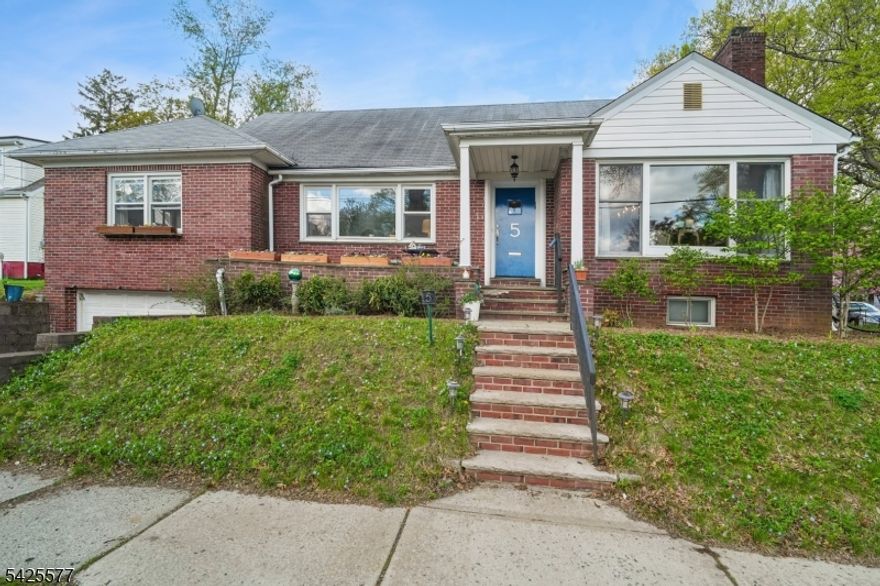 Situated on a dead-end street with park views, this beautifully maintained home offers an unbeatable Pleasantdale location just one block from Kelly Elementary. A charming front porch invites you to relax and take in the serene park setting, while mature plantings and well-established perennial gardens add to the home's curb appeal. Enjoy walking to multiple houses of worship, shops, restaurants, and convenient proximity to Route 280 perfect for commuters. Inside, this home features three finished levels of flexible living space. The main level offers an eat-in kitchen, living room, dining room, two bedrooms, a full bath, and an office/sunporch with stunning views ideal for working from home or relaxing. Upstairs, you'll find two additional bedrooms and another full bath, providing plenty of space for guests or extended living. The fully finished basement is a standout, featuring high ceilings, a spacious recreation area, second kitchen, office, and a full bath. The bathroom is ADA accessible with a walk-in shower, making this level ideal for guests or use as an in-law suite. With direct access to the attached two-car garage, convenience is built in. Plus, the basement is fully waterproofed with a French drain and two sump pumps with a battery backup, offering peace of mind year-round. The house is also wired for Cat 5 ethernet, ideal for home offices.A rare opportunity combining location, space, and versatility don't miss this exceptional home!