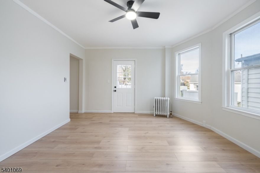 Welcome to 71 Broad St in Summit, NJ - a beautifully updated first-floor unit in a multi-unit home offering a private deck and access to exceptional outdoor space. This home has one of Summit's most desirable locations with access from both Broad St and quiet residential Dayton Rd.  This property is ideally situated near Summit's vibrant downtown, commuter transportation, restaurants, and shopping which results in convenience and comfortable living. This spacious one-bedroom unit features new wood floors, a bright eat-in kitchen with new appliances, and a comfortable living area ideal for relaxing or entertaining. The dedicated private deck provides a rare outdoor retreat perfect for morning coffee or evening unwinding. The unit also includes basement access with a shared washer and dryer. Residents enjoy an enormous, fully fenced, flat backyard a shared outdoor space perfect for playing, gardening, or entertaining. Parking is convenient with one spot in the detached garage and an additional parking space in the backyard. This is a standout opportunity to enjoy Summit living with comfort and convenience.