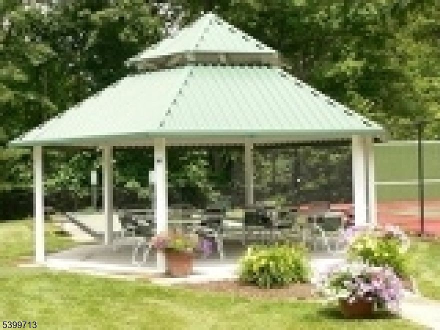 55+ Community- NO pets! New flooring in the etire unit, new oven, and freshly painted!  First Floor unit and located near one of the exit doors to your assigned parking spot.  Building has a library, exercise room, party room, storage space included.  Two newer heat pumps, and the best of 55 + living!  Pool, hot tub, shuffle board, bocce ball, walking paths and more. NO pets are allowed in this complex for any tenants!  Not the landlord's rule it is a complex rule. Garbage and recycling inside the building, Wonderful living space!