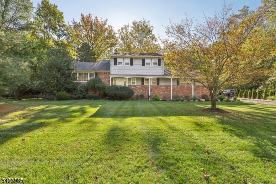 Welcome to this stunning impeccably renovated 4-bedroom, 2.1-bath Split Level home which offers the perfect blend of modern design and timeless comfort. Located on a tree-lined street in a desirable neighborhood, this home features a stunning new kitchen, beautifully updated baths, new tile flooring in the foyer, and refinished hardwood floors throughout. Step into a gorgeous newly tiled entryway that opens to a a spacious family room boasting a full wall of windows. versatile first-floor bedroom or ideal home office, and a sleek powder room. The attached two-car garage adds convenience and storage. The show-stopping kitchen with crisp white cabinetry, stainless steel appliances, and high-end finishes is adjacent to a formal dining room and a sun-drenched living room with expansive windows. Upstairs, retreat to three generously sized bedrooms, including a serene primary suite with spa-like ensuite bath featuring a soaking tub. A second full bath adorned with imported Spanish porcelain tile completes the upper level. The lower level offers a flexible space for a recreation room, gym, office, and laundry. Ample closet space throughout the home ensures storage for every need. Outside, enjoy 1.14 acres of lush, large newly painted deck, private backyard space providing your personal oasis for relaxation, play, or entertaining. This home is the perfect blend of convenience and style. Ideally located near top-rated schools, shopping, dining, and transportation.