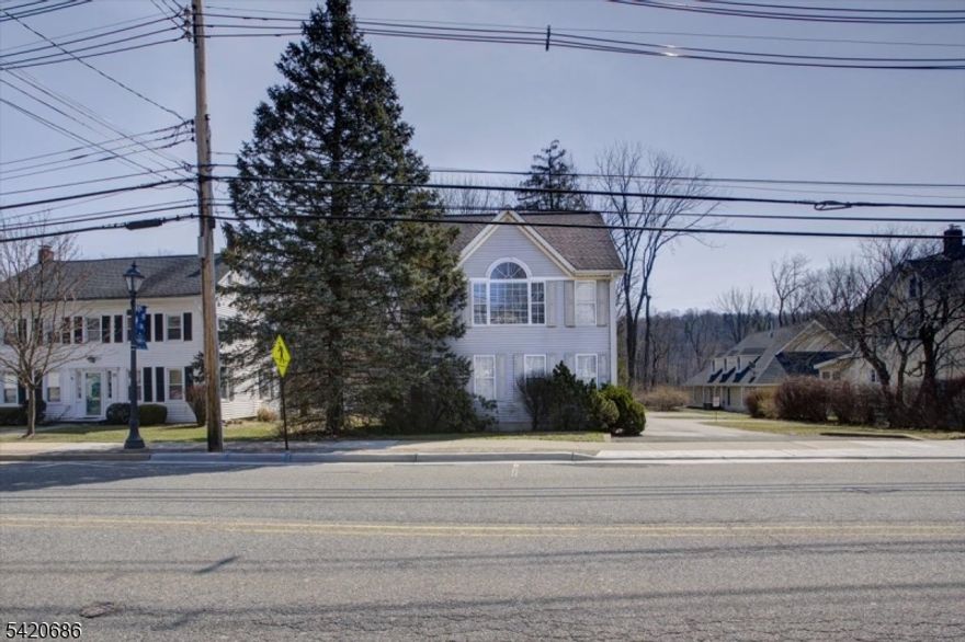 Prime downtown location with 2 car detached garage. Handicap accessible. Two baths - finished basement. First floor offers entry foyer, full bath- kitchen and 2 offices. The second floor has 3 offices with the executive suite offering custom built-ins and cathedral ceiling. Multi use - bring your imagination.