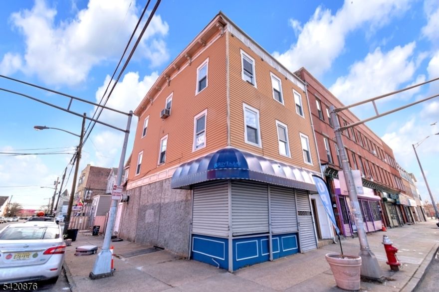 Positioned just one block from the Elizabeth Port Waterfront, this versatile mixed-use property offers the perfect blend of location, income, and opportunity. The building features a commercial space along with two residential rental units, ideal for generating consistent income while maintaining flexibility for various uses. A full basement provides additional storage and functional space. With a current rent roll of approximately $7,000 per month, this property delivers immediate returns in one of Elizabeth's most promising and developing areas. Whether you're an investor or owner-user, this is a unique chance to own a well-located, income-producing property near the waterfront.