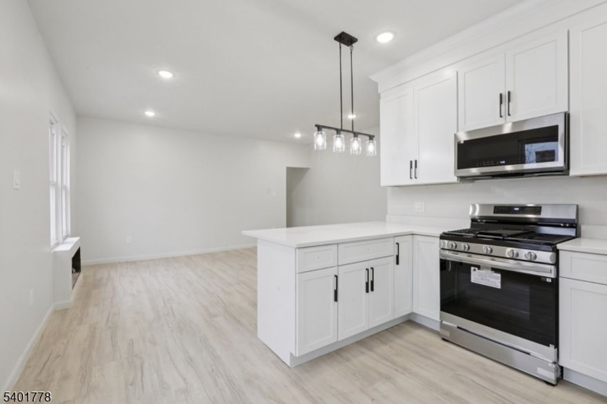 Welcome home to these brand new renovated apartments, where you'll be the first occupants to enjoy everything brand new. Featuring 4 bedrooms, 1 bathroom, stainless steel appliances, and high-end finishes, this cozy residence offers in-unit laundry, a balcony, and a shared backyard. Nestled in a peaceful neighborhood while being steps from transportation, this home blends comfort, convenience, and style.