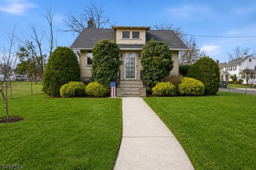 Move right into this well-maintained 3-bedroom, 2-bath home in close proximity to Cranford's vibrant downtown. The home features a bright, open layout with main living spaces on one level, 8.5-foot ceilings, fresh neutral paint, and abundant natural light from east-facing windows. The living room includes a functional wood-burning fireplace, while the spacious eat-in kitchen offers a center island, park views, and room for gathering. A large deck provides the perfect space for entertaining or relaxing, with direct access to Lincoln Park offering expansive, unobstructed green space without the maintenance.Additional highlights include a new roof (2023), updated bathroom (2024), and a three-quarter finished dry basement with flexible space for a home office, recreation, or playroom, along with laundry.The property also offers a fenced yard, three oversized planter boxes, attic storage, and an oversized two-car detached garage with a four-car driveway and wiring for a Level 2 EV charger.