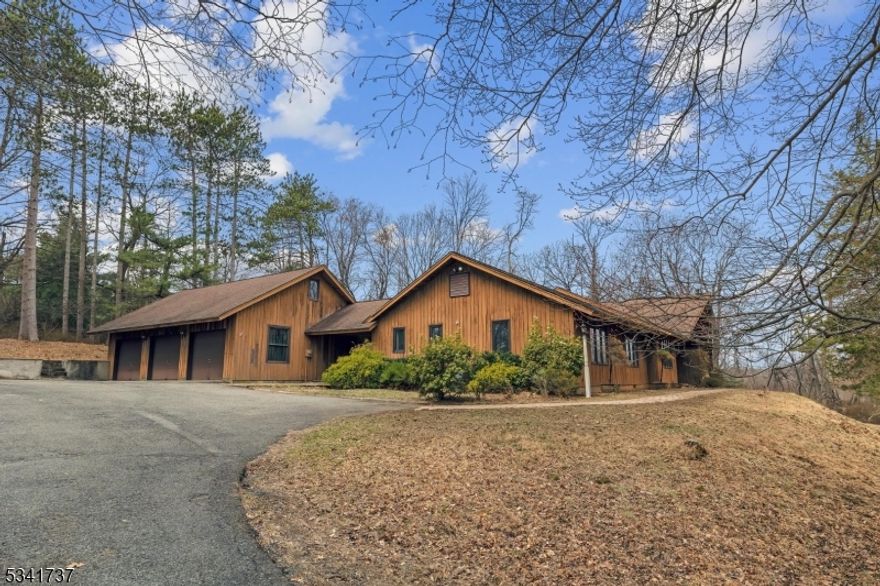 Quiet cul de sac location for this single floor living ranch home, on beautiful lot within prestigious Saddle Hill!  Vaulted ceilings and lots of natural sunlight create the warm and inviting atmosphere for living and entertaining.  Huge kitchen with vaulted ceiling overlooks pool area, foyer, formal dining room and great room create an open floor plan for a perfect flow.  Other features include a 2 car detached garage and 3 car attached garage with cabana/changing area with shower for inground pool, walk-out finished basement with kitchenette, spiral staircase to loft area overlooking great room, primary suite with 3 walk-in closets plus 3 additional spacious bedrooms.  Forced air heat and central air for cooling.  Terrific Mendham Twp. location - minutes to NJ Transit Train, excellent school system, West Morris Mendham High School and a short ride to Morristown with theaters, dining and more. Surveillance equipment in use.