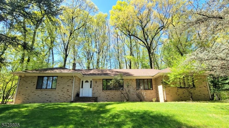Welcome to this spacious 2,256 sq ft single-level ranch offering comfort, functionality, and a prime location. The main level features a generous Living Room, formal Dining Room, Eat-in Kitchen, and a large Family Room ideal for both everyday living and entertaining. The home includes 3 Bedrooms, 2 Full Baths, and a walk-in closet for added storage and convenience. Hardwood flooring lies beneath the carpeting throughout, offering additional value and potential.The finished basement provides approximately 950 sq ft of additional living space, complete with an open Recreation Room and a Powder Room perfect for a home office, gym, or entertainment area.Upgraded in 2019, the home features high-efficiency gas heating with a two-zone hot water baseboard system for improved comfort and energy efficiency. A two-car attached garage is complemented by an extra-wide driveway that can accommodate up to 10 vehicles.This tree-lined property is situated on a quiet street, yet conveniently located near major highways, shopping, parks, and public transportation, including access to NJ Transit stations such as Morris Plains Station, Mount Tabor Station, and Denville Station for an easy NYC commute. Located within the highly rated Parsippany school district. A rare opportunity to own a well-maintained home with space, flexibility, and excellent accessibility. Some pictures are decluttered using AI.
