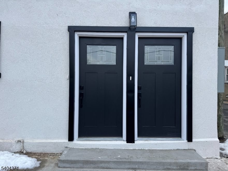 Welcome to this newly renovated side by side 2-family home located in the Silver Lake section of Belleville, NJ. This multifloor 3-bedroom, 2.1-bath apartment offers everything you need. Enjoy an open-concept kitchen with stainless steel appliances, granite countertops, and hardwood floors throughout. The unit includes in-unit laundry and access to a backyard patio also includes a private rooftop terrace. Please note: no driveway or parking included - on street parking. Features central A/C and forced hot air. Conveniently located near local shops, restaurants, and parks, with the Silver Lake Light Rail just down the block - access to Newark /New York Penn Station & other stops along the Hoboken, JC, Newark Airport, Etc. 1 pet under 25 lbs.