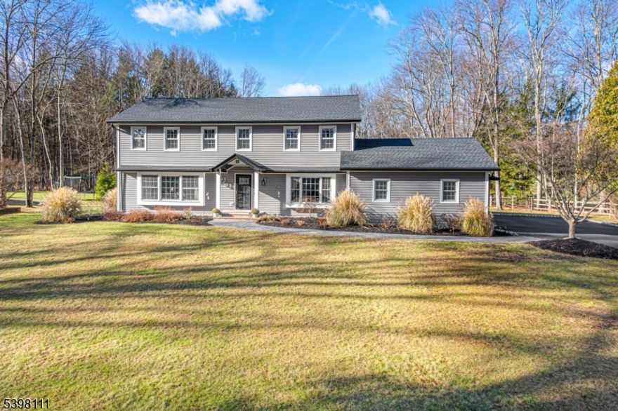 Pristine Center Hall Colonial in much desired Mendham Borough neighborhood.  Close to schools, shopping and Patriots Path. New primary bathroom complete with marble tile and vanity. Large custom closet in primary bedroom as well as all new recessed lighting. Updated half bath on first floor (2019). All new Frigidaire Gallery stainless steel kitchen appliances.  Beautiful new paver patio, landscaping with privacy arborvitae, new bluestone side entry stairs and paver front walkway.  New Timberline roof with replacement of plywood and attic insulation and flooring (2024). All  new vinyl siding, awnings, new outdoor lighting, gutter, soffits, portico, entry doors as well as new insulate garage doors and openers (2023).  New gas line for outdoor grilling. New asphalt and Belgian block driveway and apron (2025).  All new bedroom ceiling fans.  New 50 gallon hot water heater. New custom built Amish shed on large level rear yard. Highest and best due by Tues 12/9 at 5:00 PM
