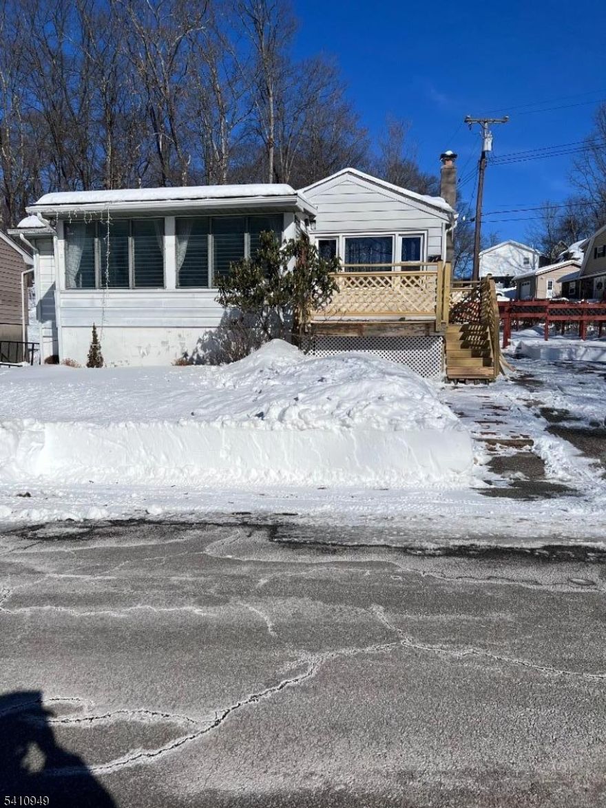 Adorable well taken care of updated ranch set on a corner offers a newer kitchen, a cozy front enclosed porch. and a fenced in yard along with a partially finished basement. Tenant insurance required. NTN Credit report required.The Home is wired for a generator, has public sewer and is also hard wired for a level 2 electric car charger.  Freshly painted and ready to move in.  Small to medium size dog and a cat is ok.  Washer and dryer available.