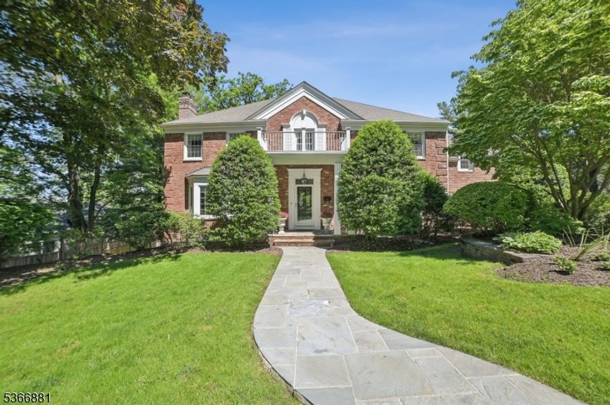 This beautifully home sits proudly on an elevated lot, offering lovely views and a professionally landscaped backyard perfect for relaxing or entertaining. Step inside and you're welcomed by a warm and inviting FR featuring a wood-burning fireplace, custom built-ins, and a beverage fridge for added convenience. A second fireplace in the living room, this one gas, adds charm and comfort, while the formal DR opens to the deck through classic French doors. The kitchen is a standout both functional and stylish. Designed with the home chef in mind, it features a 5-burner cooktop, double convection ovens, microwave drawer, refrigerator, dishwasher, granite countertops, and a timeless subway tile backsplash. The space balances beauty and efficiency effortlessly.  Just off the kitchen, a smartly designed hallway offers a mudroom, laundry room, walk-in pantry, a second staircase to the upper level, and direct access to an oversized 3-car garage.  Upstairs, you'll find five generously sized bedrooms. Three include private en-suite baths, while the remaining two share a well-appointed Jack-and-Jill. Each bedroom offers ample closet space and beautiful hardwood floors throughout.  The walk-out lower level is all about flexibility featuring a spacious rec room with a fireplace, a dedicated fitness area, wine closet, utility room, PR, and a sunporch that steps out to a patio with a built-in fire pit. Whether it's a quiet evening or a weekend gathering, this space is ready for it all.