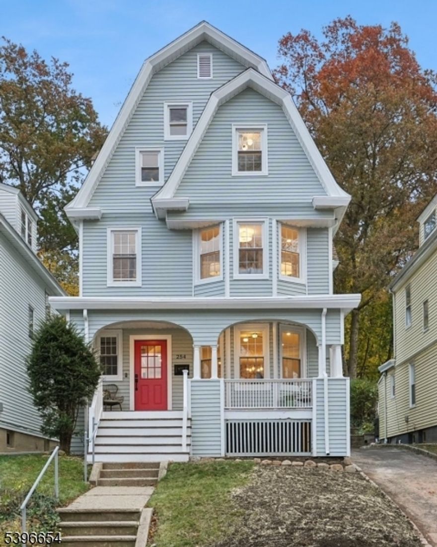 Welcome to this stunningly renovated turn of the century South Orange home, just moments from downtown village shops, cafes, and restaurants and a commuter's dream with the NYC direct train nearby. Reimagined from top to bottom by a trusted local builder with a stellar reputation, this home combines the sophistication of a Brooklyn brownstone with the comfort and space of suburban living. The inviting front porch is perfect for lounging, chatting with neighbors, and watching the world go by. Inside, you'll find bright, airy interiors with impressive ceiling height and an ideal open flow. The new kitchen features modern cabinetry, sleek countertops, and premium finishes, and opens directly to the formal dining room, creating a perfect space for entertaining. The second floor offers 3 spacious bedrooms and a beautifully designed full bath. The third floor is home to a luxurious primary suite with a large picture window overlooking the backyard, two walk in closets, and a luxe bath with double sinks, a glass-enclosed shower, and heated floors. A fourth bedroom on this level makes a great home office or guest room. Every detail has been updated, including all new electrical, plumbing, and windows, plus brand new two-zone central air and heating.