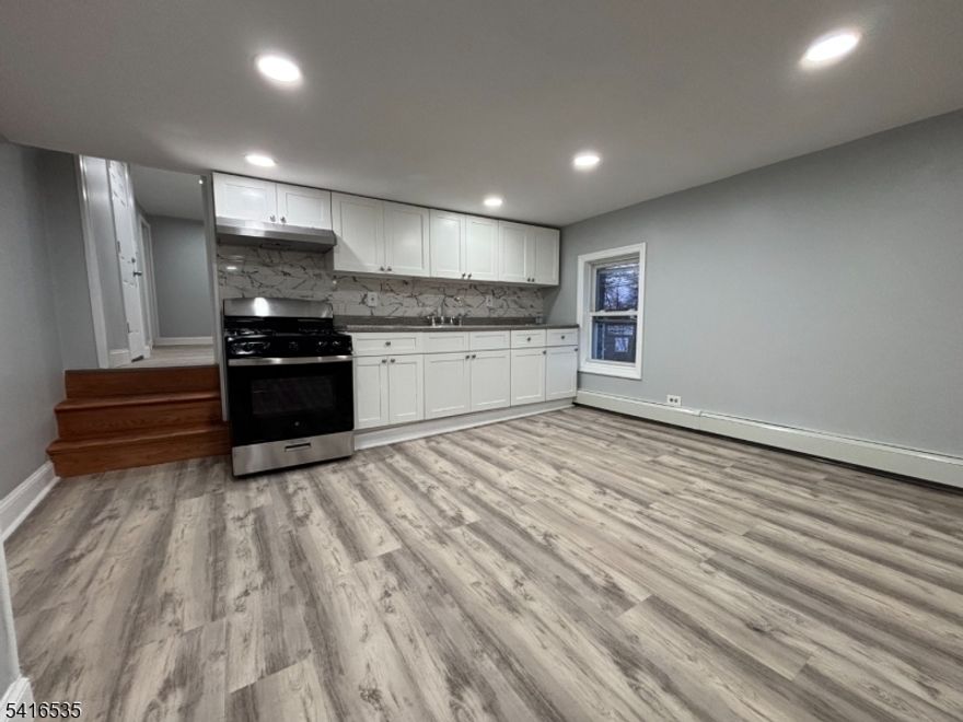 Stunning Renovated 2BR Apartment in Roselle!Step into modern comfort in this beautifully renovated 2-bedroom apartment featuring a unique layout that maximizes both space and style. The unit has been fully updated with brand-new kitchen appliances, contemporary flooring, and a refreshed bathroom with new fixtures. Recessed lighting throughout creates a warm and inviting atmosphere perfect for relaxing or entertaining. parking may be available for $100 more per month per carHighlights:  Fully renovated throughout  Spacious layout with great functionality  Brand-new kitchen appliances  Modern flooring  Updated bathroom with new fixtures  Recessed lighting  Water included (tenant pays gas & electric) Hermoso Apartamento Renovado de 2 Habitaciones en Roselle! Disfrute de la comodidad moderna en este apartamento de 2 habitaciones completamente renovado con un diseno unico que maximiza el espacio y el estilo. La unidad cuenta con electrodomesticos de cocina nuevos, pisos contemporaneos y un bano actualizado con accesorios nuevos. La iluminacion empotrada crea un ambiente c lido y acogedor, perfecto para relajarse o recibir visitas. No pierda la oportunidad de hacer de este apartamento renovado su proximo hogar! Caracteristicas:  Completamente renovado  Diseno amplio y funcional  Electrodomesticos de cocina nuevos  Pisos modernos  Bano actualizado con accesorios nuevos  Iluminacion empotrada  Agua incluida (inquilino paga gas y electricidad)