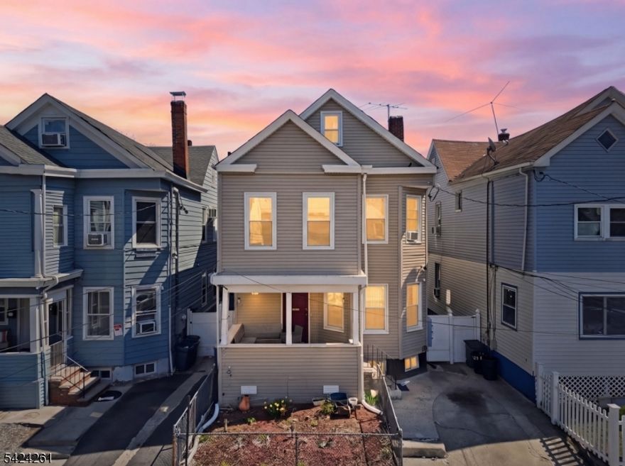 Spacious multifamily property with 2 units and 2 bonus units located in Paterson's desirable Eastside section offering approximately 2,800+ sq ft of living space on a 3,000 sq ft lot. The first floor offers 3 bedrooms with living room, dining room and kitchen. Second floor offers 4 bedroomd with living room, dining room and kitchen. Bonus spaces with basement and attic which are both finished with full bathrooms. This property presents a great opportunity for investors or owner-occupants seeking strong potential in a well-established neighborhood. Generous interior layout provides flexibility for a variety of living arrangements, complemented by a private yard space with an above ground pool. Conveniently situated near major highways, public transportation, schools, shopping, and local amenities. Ideal for those looking to customize or enhance value.