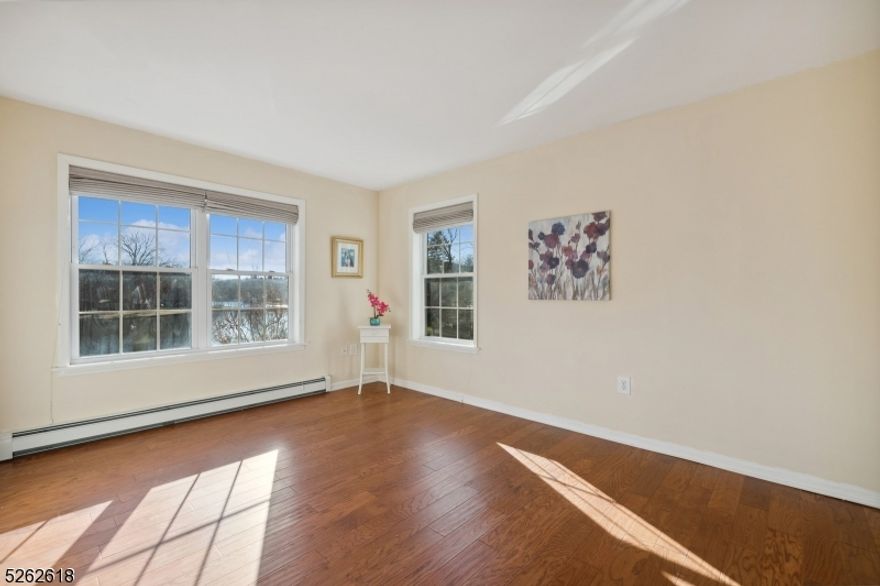 Rare opportunity to experience Lake Front living is here!  Bright and light home with wall of large windows overlooking the lake will welcome you!  First floor features foyer, open concept with living and dining rooms, upscale kitchen with stainless steel appliances, an island, and a pantry, powder room.  Second floor offers primary suite with large bath featuring double sink, the shower, the jetted tub; and a walk in closet.  There are two other spacious bedrooms, main bath, and a laundry room.  Property offers fenced in yard, decks to enjoy the lake and its own dock.  Conveniently located near Downtown Denville and the highway.  Good credit a must, NTN and rental application are required. First $100 in repairs to be paid by tenant.  Real estate fee is paid by the tenants  Come and see!