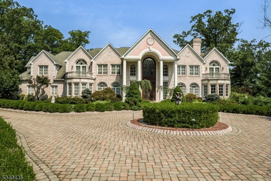 Welcome to 18 Quail Run, a truly exquisite residence nestled on a cul-de-sac in the prestigious enclave of Warren. With five bedrooms, six bathrooms, walk-out fully finished basement this magnificent estate home spans about 10,000 square feet, offering experiences like a theater and full kitchen in the lower level, steam shower, sauna, and separate maid quarters. Situated on an expansive 2-acre gated property, this home features a serene koi pond in the backyard and a paver circular driveway leading to the grand entrance. Inside you will be captivated by the impressive double butterfly stairwell & the sophisticated office with custom mahogany bookshelves and a fireplace. The layout seamlessly integrates indoor and outdoor living, with five French doors inviting you to explore the vast grounds. The great room, boasting 21-foot ceilings, is ideally positioned off the kitchen, making it perfect for gatherings. The first floor ensuite is perfect for a long term guest. The primary suite is a private retreat, featuring a balcony overlooking the lush property, a sitting room, two walk-in closets, and an expansive ensuite. Each bedroom includes its own bathroom. The walkout lower level is a hub of entertainment, complete with a full kitchen including a commercial exhaust, and a full bath with sauna. The movie theater, meeting room, & custom bar allows this property to truly be called an estate. Don't miss this gated, private estate minutes from Route 78 and Newark airpot!