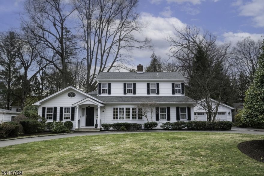 This beautifully maintained Colonial is set on a .37-acre level lot in a sought-after Summit Northside location, offering an exceptional combination of space, flexibility, and outdoor enjoyment. The large, flat backyard provides a rare and inviting setting for outdoor living, gardening, or recreation, and is fully fenced for added privacy. Inside, the home features a flexible floor plan with the option for a first- or second-floor primary bedroom, allowing the layout to adapt to a variety of living needs. The office can easily be transformed into a 5th bedroom. The renovated kitchen and updated baths add modern comfort, while the kitchen and family room overlook the expansive rear yard. An inviting sunroom with radiant heat offers a bright, comfortable space to relax year-round. Additional highlights include hardwood floors throughout, multi-zone heating and air conditioning, custom built-ins, a fireplace, California Closets, circular driveway, underground sprinkler system, security system, and generator. Conveniently located near Summit's vibrant downtown, transportation, and parks, this home offers an ideal blend of comfort, versatility, and a standout property setting.