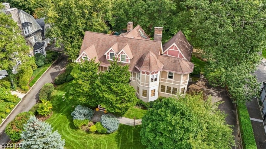 Old World Elegance Meets Modern Living Welcome to this exceptional 6 bedroom, 4 full bath, 2 half bath Victorian in the heart of Summit. Moments  from downtown shopping, dining, weekend farmers market, and NYC rail service, this home combines timeless architectural charm with thoughtful modern updates.  Step through the grand foyer complete with a working fireplace, leaded glass windows, and elegant woodwork. The first floor has high ceilings, rich details, and spacious rooms. A beautifully designed addition opens the kitchen to the FR and sunroom, creating the perfect setting for today's lifestyle.  Upstairs, the Primary Suite is a true retreat with a sitting room and includes a large bathroom with shower and jacuzzi tub, double vanities and medicine chests, radiant heat. There's a dressing room with laundry, WIC, and a cozy sitting room with its own FP. The 2nd floor also features two ensuite bedrooms plus one additional bedroom, while the third floor provides a sitting room, two bedrooms, a full bath, and an office ideal for work or study.  The lower level is designed for entertaining with a rec room, billiards room, wine room, laundry room and half bath. Outside, enjoy a private patio overlooking the in-ground pool and pool house, complete with full bath and W/D perfect for summer gatherings.  Set in one of New Jersey's most desirable towns, with top-rated schools and a short commute to NYC, this home offers an unmatched blend of old-world charm and modern convenience.