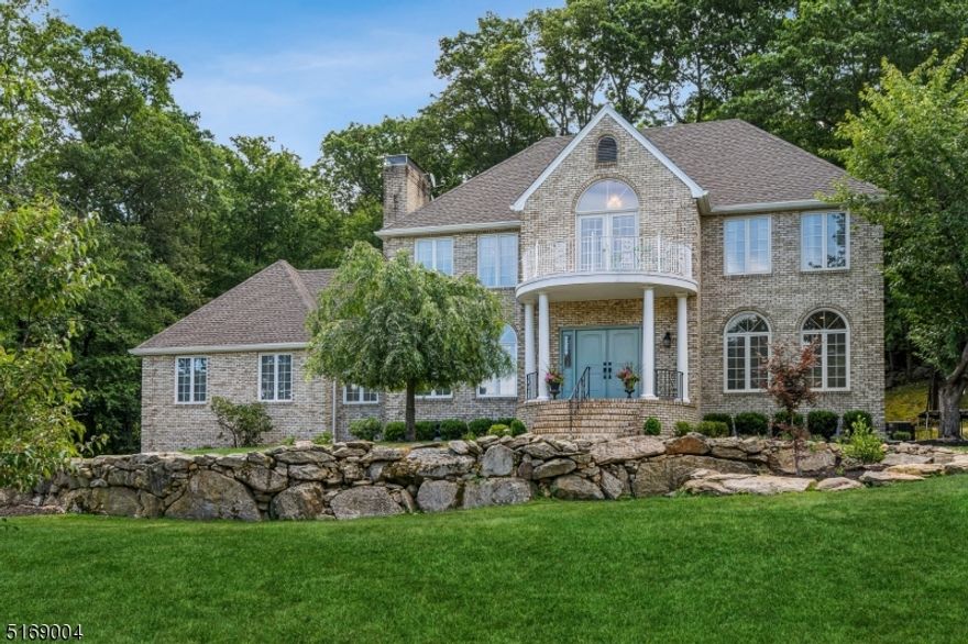 IMPRESSIVE, STATELY COLONIAL!!!  Bright and light, large, and beautiful home in cul de sac location with amazing curb appeal is waiting for you!!  First floor features spacious foyer leading to a living room with a gas fire place; amazing renovated kitchen with an island, quartz counters, breakfast area; huge family room; dining room or an office; powder room, as well and in law suite offering another living room, bedroom, and full bathroom. Beautiful, large windows make this home super special! Second floor will impress you with den area opening to a balcony; master bedroom suite with a fire place, walk in closet, bath featuring jetted tub and shower; three additional bedrooms, main bath and laundry room for your convenience.  Large, partially finished basement provides plenty of space for entertainment.  Above ground pool and hot tub (both sold as is), spacious deck, fenced in yard complete the picture of perfection!!