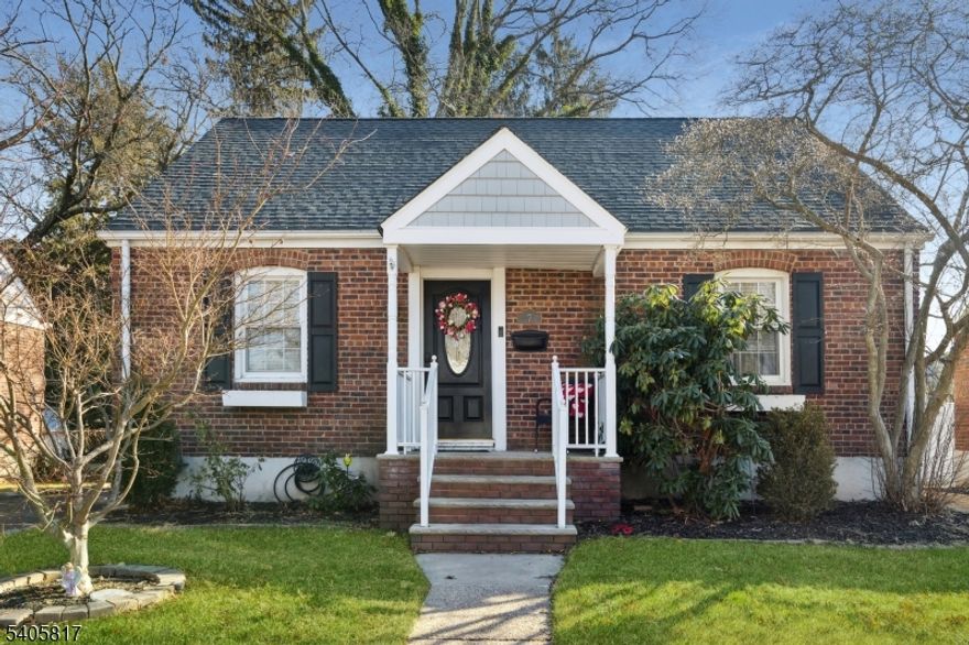 Welcome home to this charming 4-bedroom Cape Cod, ideally located in Cranford's desirable Indian Village neighborhood. This sun-filled home features a spacious living room, an adorable eat-in kitchen, and a full bath with tub/shower. Two first-floor bedrooms showcase custom board-and-batten molding, hardwood floors, new lighting, and fresh paint. The second level offers two generously sized bedrooms with great closet space. The walk-out basement has been waterproofed and is ready to be finished, offering abundant storage and a dedicated laundry area. Enjoy the super-spacious, fully fenced backyard perfect for entertaining, relaxing, or play. A low-maintenance exterior with brick and vinyl siding, along with a newer roof and HVAC, provides peace of mind. Conveniently located just blocks from schools, Mohawk Park, shopping, and restaurants. Move right in and enjoy all this wonderful home has to offer.