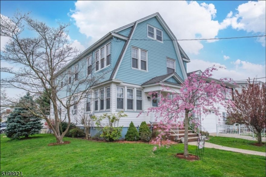 Calling all investors! This Up & Down two family home is on a corner lot and offers identical floor plans with 2 bedrooms and 1 full bath in each unit. Each unit offers an open floor plan with separate spaces for dining area, living room and an additional nook, which could be used as an office. Home is complete with HW floors under carpet, recessed lighting, large unfinished basement and attic for plenty of storage. This home has many updates including every window. This neighborhood offers sidewalks and public utilities/natural gas. Fenced in backyard excellent for entertaining with above ground pool, shed & gazebo. Great location - closed to Parkway, Turnpike, bus stop to NYC, Train Station and plenty of restaurants & shopping.