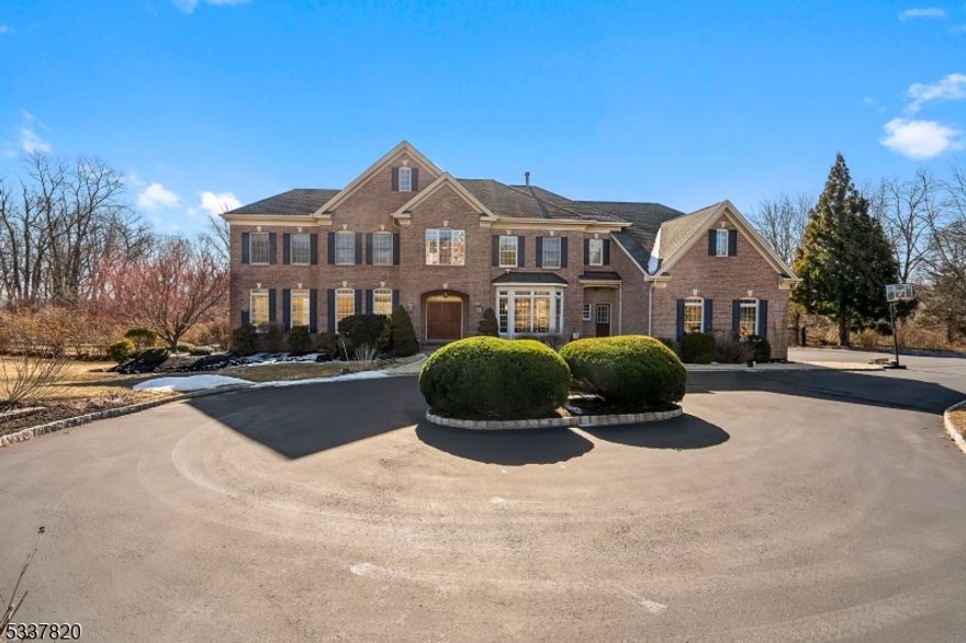 Nestled at the end of cul-de-sac, this magnificent home sits on an unparalleled lot with a breathtaking park-like setting. A circular driveway leads to a gorgeous in-ground pool, hot tub, and cascading waterfall an outdoor oasis perfect for entertaining.Inside, custom features and upgrades abound. The light-filled gourmet kitchen boasts custom cabinetry, granite countertops, and new stainless-steel appliances. The elegant foyer opens to multiple inviting spaces, including three rooms with cozy fireplaces.The luxurious master suite offers two sitting rooms, two walk-in closets, and a spa-like bath. The finished lower level, with a full bath and recreation room, opens through glass doors to the pool and beautifully landscaped patio, seamlessly blending indoor and outdoor living. A must see!