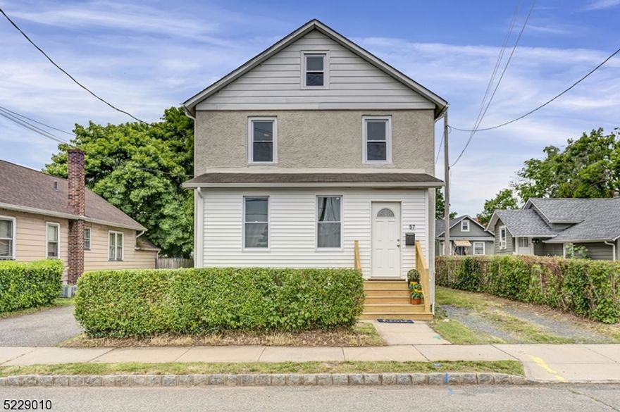 Your homeownership dreams come true! Located in historic Flemington, this newly renovated gem offers 3 bedrooms, 2 full bathrooms, and a host of modern upgrades. Step inside to the versatile enclosed front porch, perfect for a cozy nook or practical home office. Let your creativity flow as you customize this space to match your lifestyle. As you continue inside you'll find a thoughtfully designed open concept floor plan that maximizes every square foot. The tastefully renovated kitchen, the heart of the home, showcases modern fixtures and finishes. A breakfast bar connects to the dining room, which seamlessly flows into the living room for effortless entertaining. A brand-new full bathroom completes the main level. Retreat upstairs to find 3 bedrooms, a second fully renovated bathroom, and a walk-up attic for added storage. The refinished dark hardwood floors exude elegance throughout, while the new windows flood each room with natural light. Enjoy peace of mind and modern convenience with the new heating system, central air conditioning, and updated electrical. Situated on a generous lot, this property offers two driveways and a detached garage, along with ample outdoor space for your leisure. Whether you're hosting barbecues, cultivating a garden, or simply unwinding under the open sky, the possibilities are endless. All this, within walking distance to charming shops, restaurants, and the array of amenities that Flemington has to offer.
