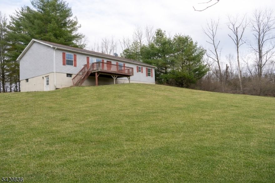 Tucked away on over 2.8 acres of private land, this inviting 3-bedroom, 2-bath home offers an exceptional combination of space, privacy, and potential. Thoughtfully designed, the home features a natural flow between the living room, dining area and kitchen, creating comfortable and functional living spaces for everyday living and entertaining. The expansive property provides generous outdoor space ideal for gardening, recreation, or simply enjoying the peaceful natural surroundings. Nestled within a serene setting, the home is complemented by a spacious front yard and a private rear backdrop, enhancing the sense of seclusion. The main level includes three bedrooms and two full baths, highlighted by a primary suite ready for your personal updates and finishing touches. A standout feature is the full walkout basement with high ceilings and solid construction, offering excellent potential for additional living space, recreation, or storage. Located in picturesque Montague Township, this home offers a quiet, rural atmosphere while remaining conveniently accessible to major roadways, shopping, and dining. Enjoy close proximity to Stokes State Forest, High Point State Park, and the Delaware Water Gap National Recreation Area, where year-round activities such as hiking, fishing, camping and kayaking await. This property is part of the First Look Offeree Program and will be marketed exclusively to owner-occupants for the first 30 days.