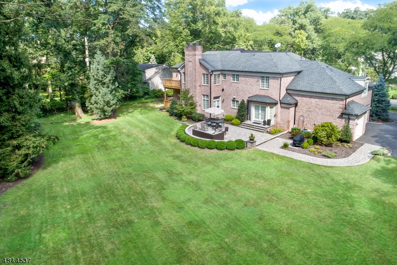 Timeless architectural details & every modern amenity imaginable in this exquisite 6 br 7½ bth sophisticated all brick col on quiet cul de sac in sought after Deerfield section Boasting almost 10,000SF, enormous Gourmet Chef's Kitch, 2-story Entry Foyer w/gracious central staircase, 10' ceilings t/o 1st & LL, breathtaking MBR Suite w/Sitting Rm, spa-like bath & HUGE WalkIn Clst, gorg Fam Rm, Liv & Dining Rms, Office/Library, Mudroom, 2 Butlers Pantries, 6 beds (all ensuite, guest rm on 1st Lvl), plus 2nd flr bonus room, coffered ceilings - 2 private porches overlooking backyard oasis w/enormous entertaining patio - Picture-perfect example of the finest in design and function - this one truly has it all! TAX APPEAL IN PROCESS