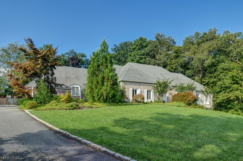 Amazing opportunity to create your dream home on this private cul-de-sac in the sought-after Deerfield section. Located against a backdrop of serene wooded hills, this 6,200+ square foot, open concept home has the potential to WOW!  Large foyer opens to spacious LR, formal DR, eat-in kitchen, family room & sunroom overlooking heated in-ground pool. First level master suite w/easy access to poolside. Three more bedrooms, baths & convenient laundry room on this level. Two beds & bath on second with two over-sized unfinished spaces primed for your vision. Partially finished lower level with powder room & rec room. Three-car garage. New retaining wall & landscaping, invisible dog fence set-up. Two new 200-amp electric panels, two Generac generator panels, new sewer line to street. Sold strictly 'as is'.